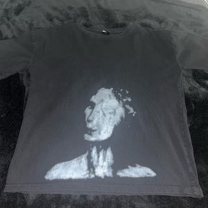 futuristic figure black shirt